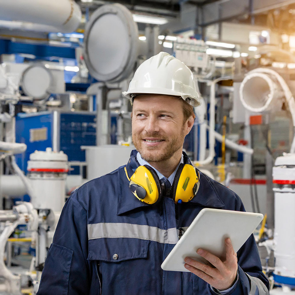 An AI generated image of a man in a ship machine room holding a tablet An AI generated image of a man in a ship machine room holding a tablet